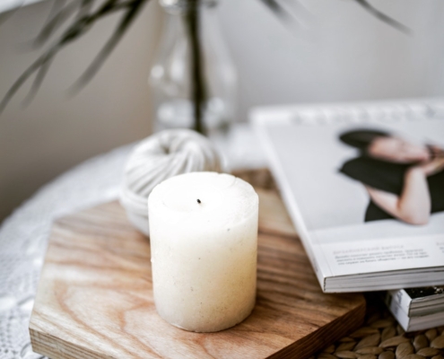 Photo by Alesia Talkachova White Pillar Candle