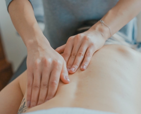 Photo by Toa Heftiba man massaging woman's body